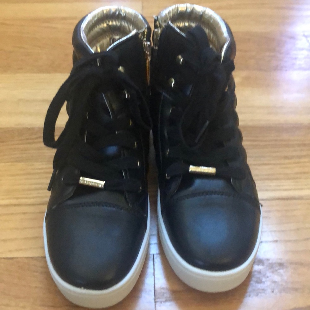 Michael Kors black quilted high top, size 4